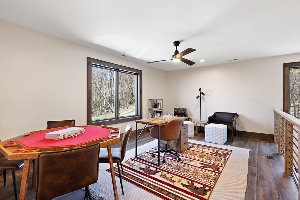 Loft with Poker Table, Desk and Reading Chairs