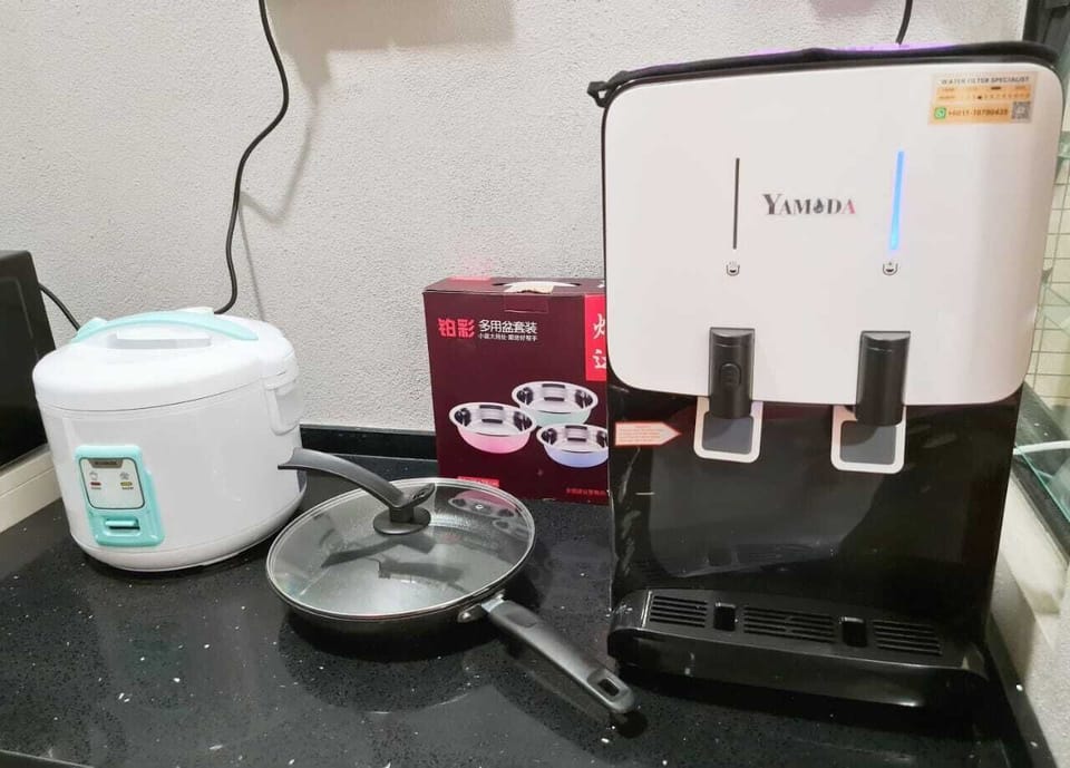Apartment | Private kitchen | Full-size fridge, microwave, stovetop, rice cooker