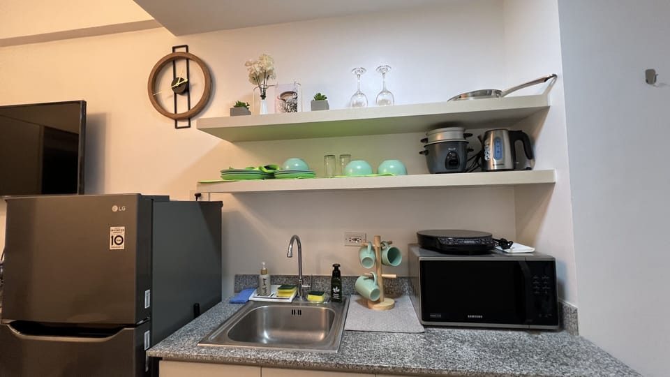 Kitchen with kitchenware and utensils