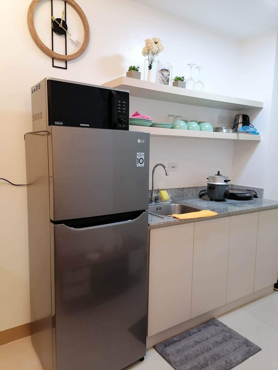 Full kitchen with rice cooker, induction cooker, microwave, full size fridge