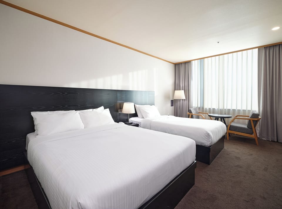 Family Twin Room | Premium bedding, down comforters, memory foam beds, in-room safe