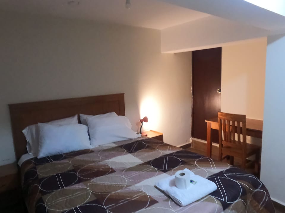 Classic Room, 1 Queen Bed | Individually furnished, laptop workspace, free WiFi, bed sheets