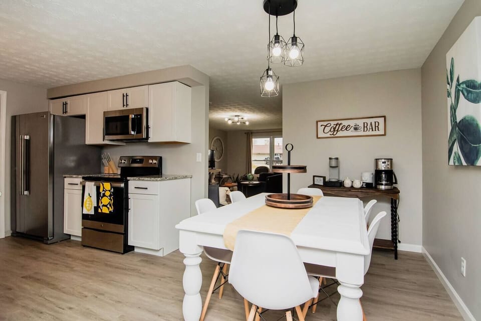 Gather around the dining table for six, perfect for family meals or casual dinners with friends.