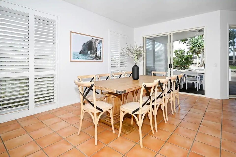 Indoor dining table for 10 guests, with outdoor dining table (undercover)