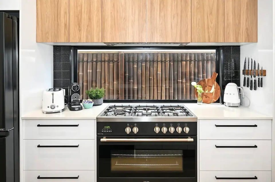 Kitchen with gas cook top and oven.
