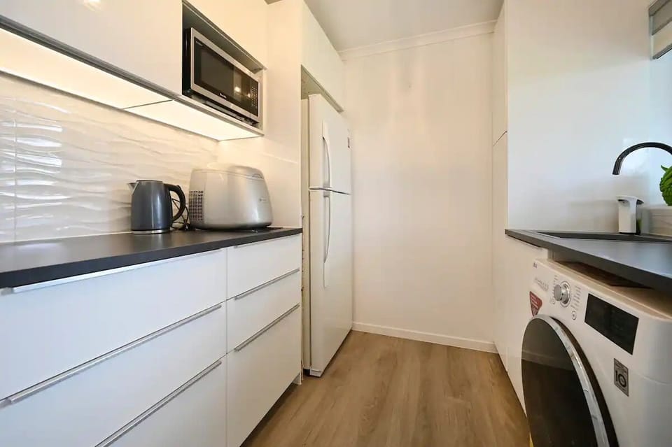 Downstairs laundry & fridge for the outdoor area