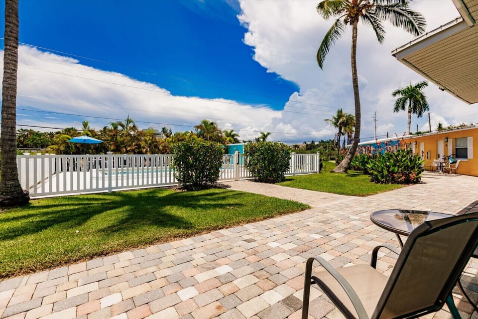 Pool view from outdoor patio seating area
