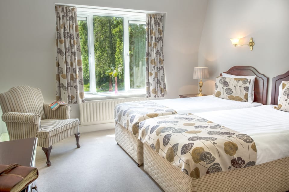 Standard Twin Room | In-room safe, desk, laptop workspace, iron/ironing board