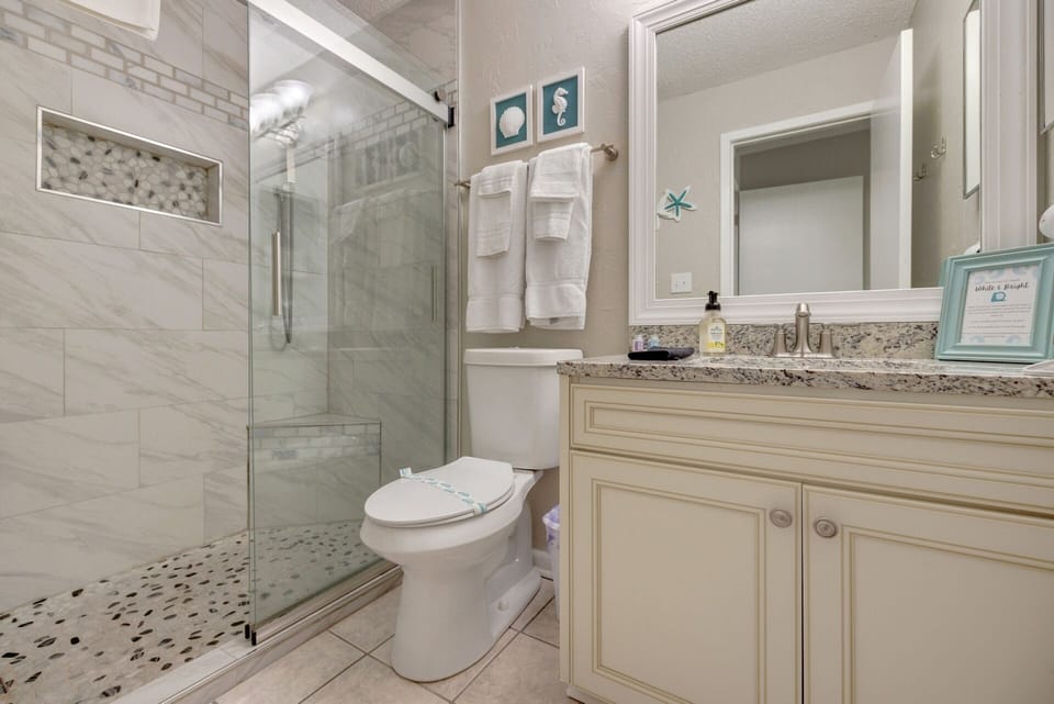 Master bathroom with walk in tiled shower