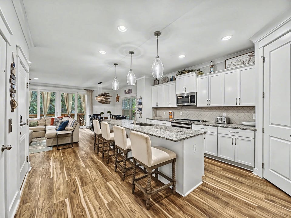 Kitchen island bar seating for 4 – extra spots for groups in Hilton Head Island luxury beach house!