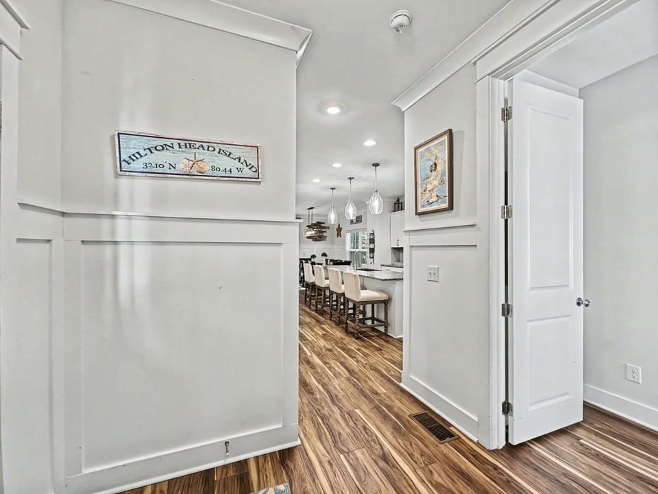 Entryway. Bright and airy modern interiors – perfect for multi-generational family vacations in Hilton Head!