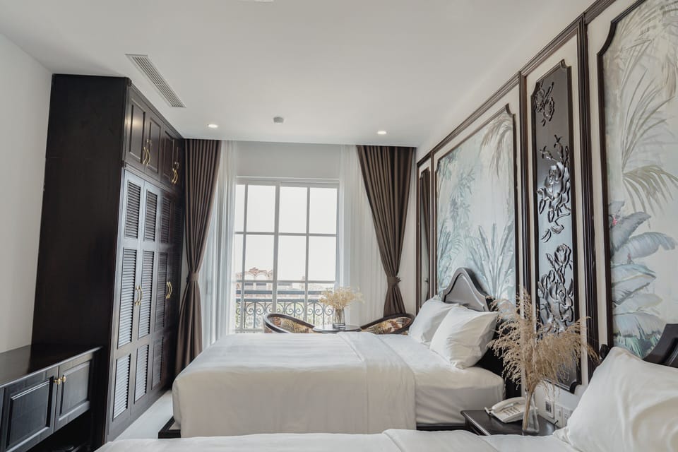 Family Triple Room | Minibar, in-room safe, desk, laptop workspace