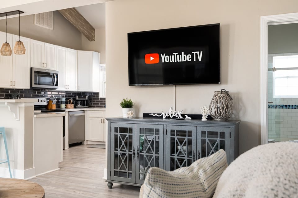 Relax in the living room watching your favorite shows. All rooms equipped with SmartTV's and  YouTubeTV included
