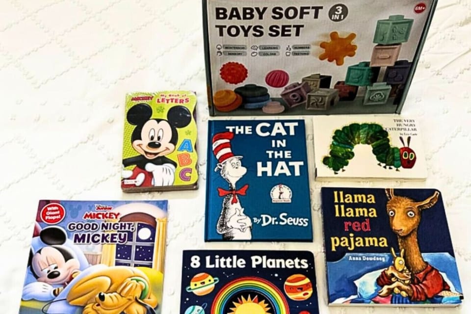 Our Home include a selection of kids` books, games, and silverware, catering to both young minds and family dining needs.