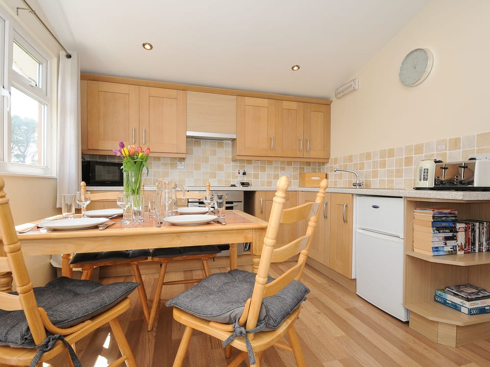 Fridge, electric kettle, cookware/dishes/utensils