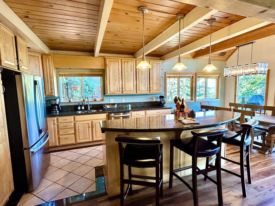 Fully stocked Kitchen and bar seating