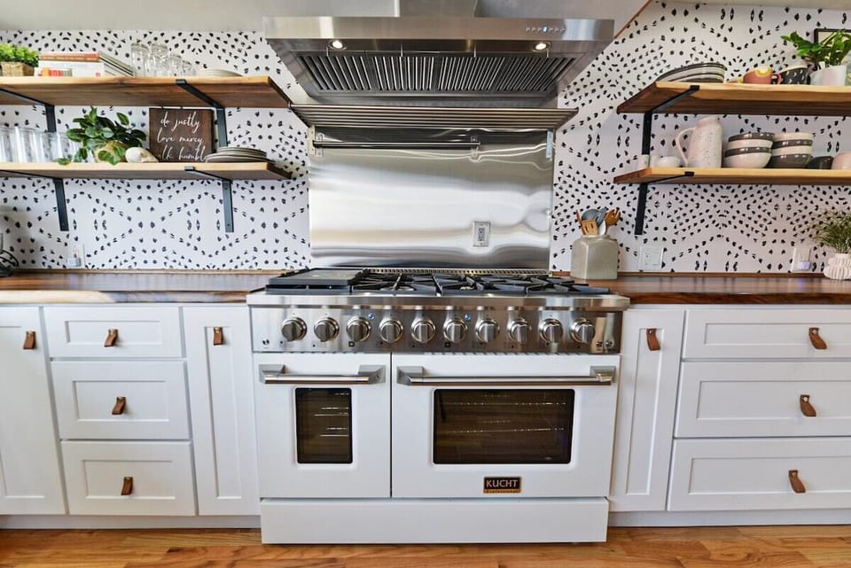 Chef kitchen ready for a feast or a quick and easy meal. The kitchen is well stocked and ready for whatever you're in the mood for. 