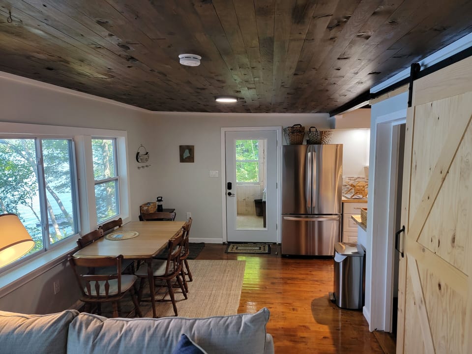 Dining Table and Entry door to porch.