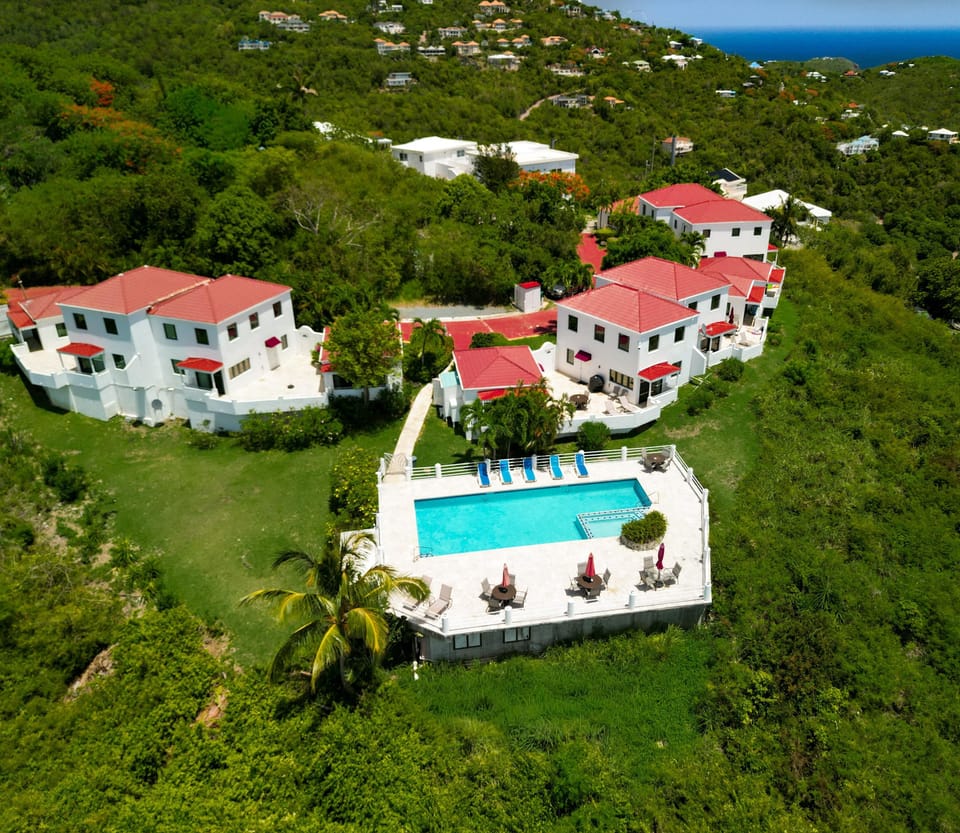 Secluded hillside retreat with pool and ocean views