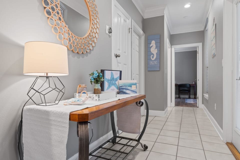 Hallway on the main level leading to the main floor King bedroom