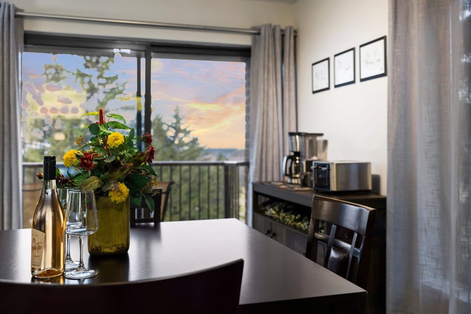 Enjoy complimentary wine on the balcony, where a stunning lake view enhances your relaxation experience.