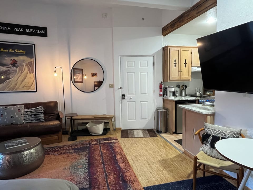 Condo entry kitchen and living area