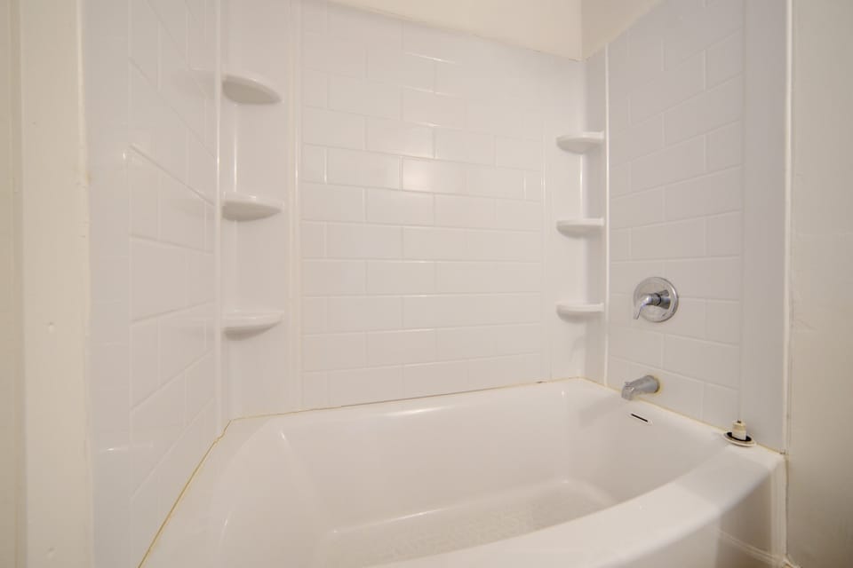 Room (2 Full Beds) | Bathroom | Designer toiletries, towels