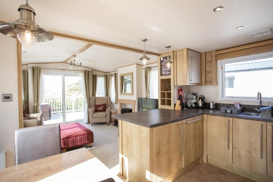 Indulgent 6 Berth Caravan | Living area | TV