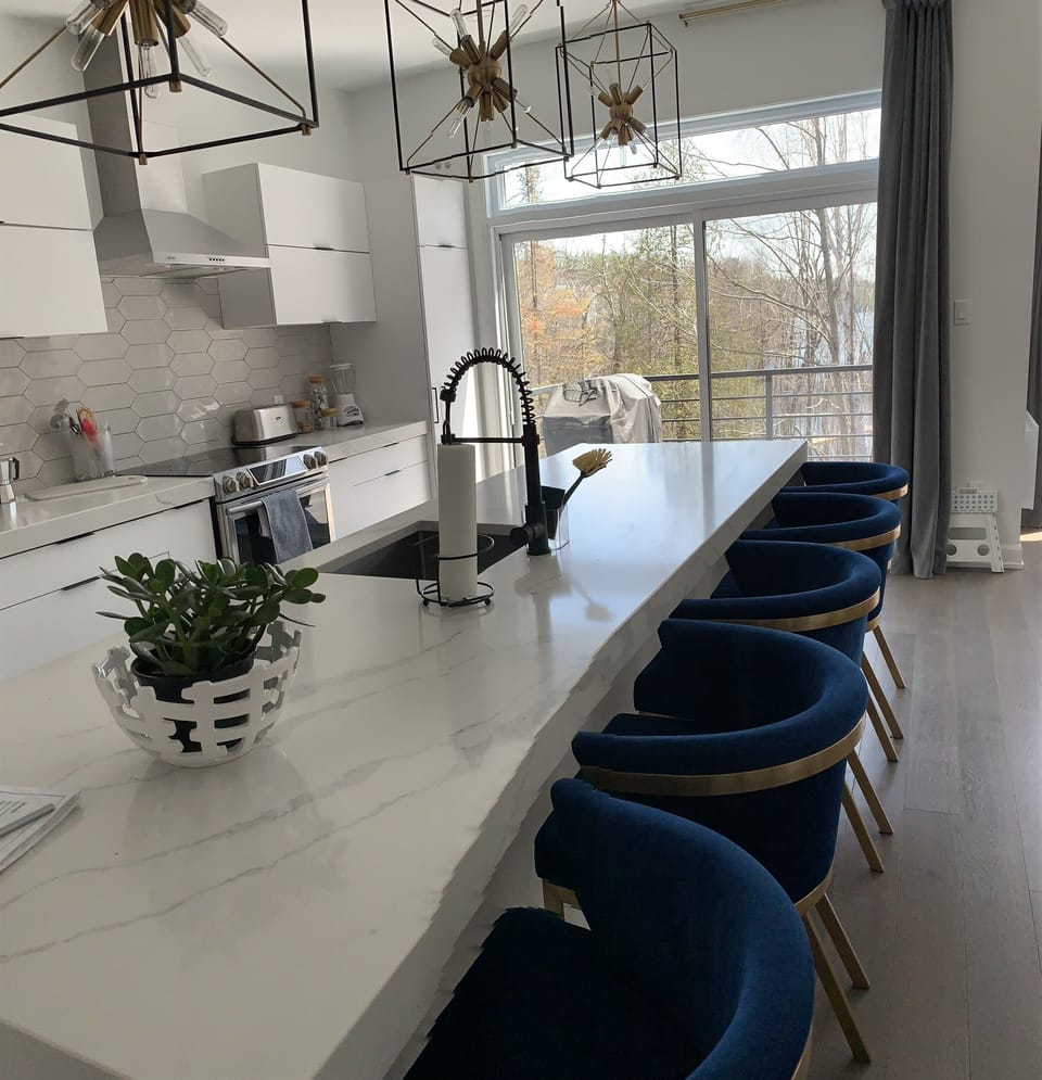 Easy access from Kitchen Counter area and Island with Beautiful View Over Lake and direct access to balcony