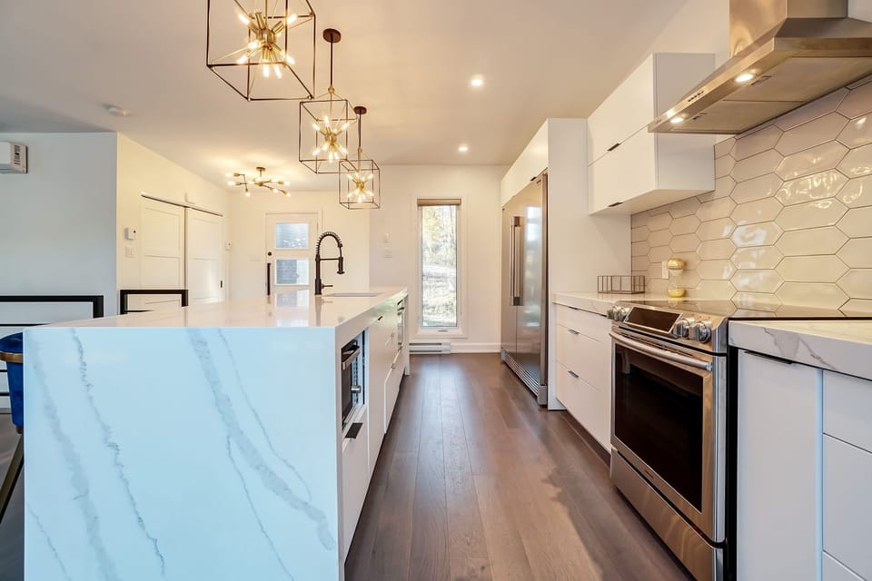 Modern Kitchen Counters and Island with clean lines and up-to-date appliances