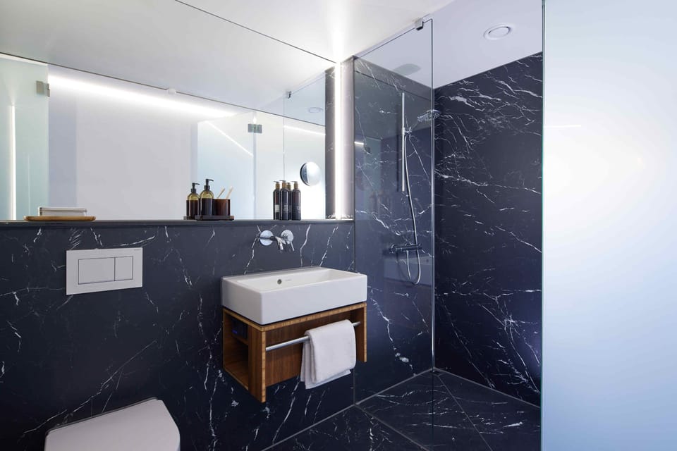 Comfort Double Room, 1 King Bed, Non Smoking | Bathroom | Shower, eco-friendly toiletries, hair dryer, heated floors (bathroom)