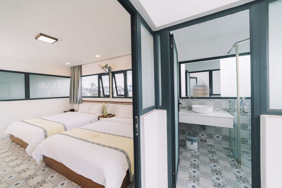 Deluxe Quadruple Room | Premium bedding, down comforters, memory foam beds, desk