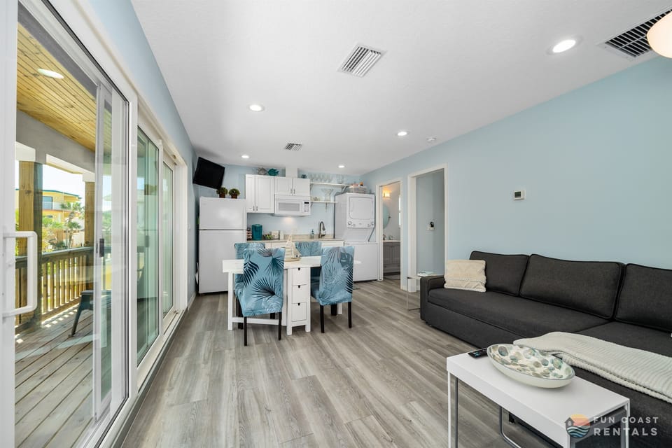 Living Room Area with Dining Table and Kitchenette