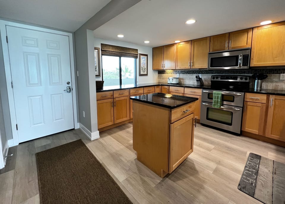 Front entrance door that opens to the completely renovated and o - Front entrance door that opens to the completely renovated and open kitchen.