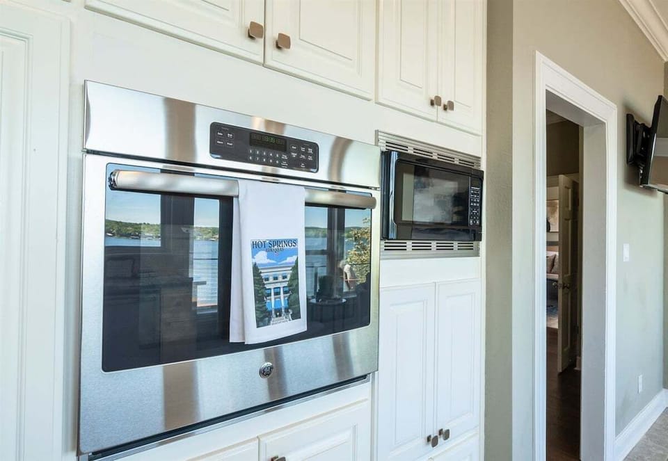 Stainless Steel Appliances - Wall Oven, Wall Microwave, Refrigerator, Dishwasher, and Electric Stove