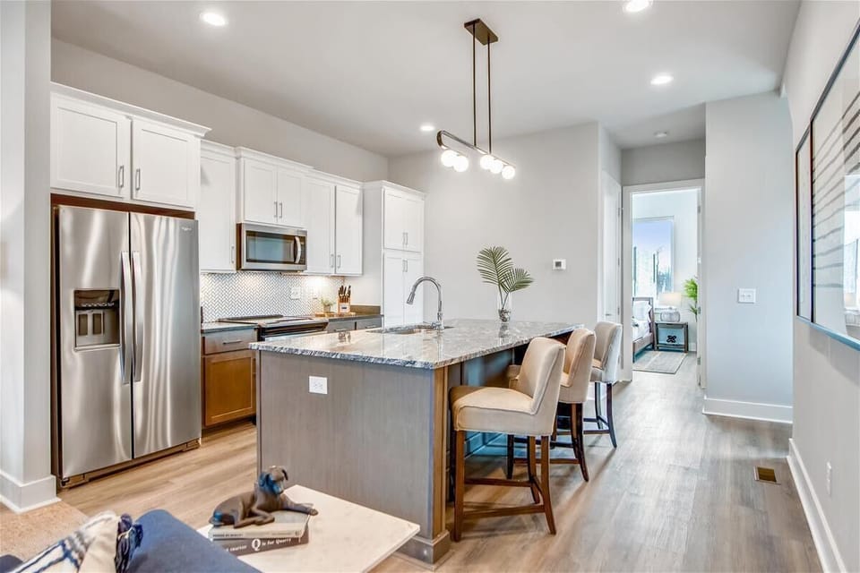 Open Concept Chef's Kitchen | Island Seating | Stainless Appliances | Second Floor
