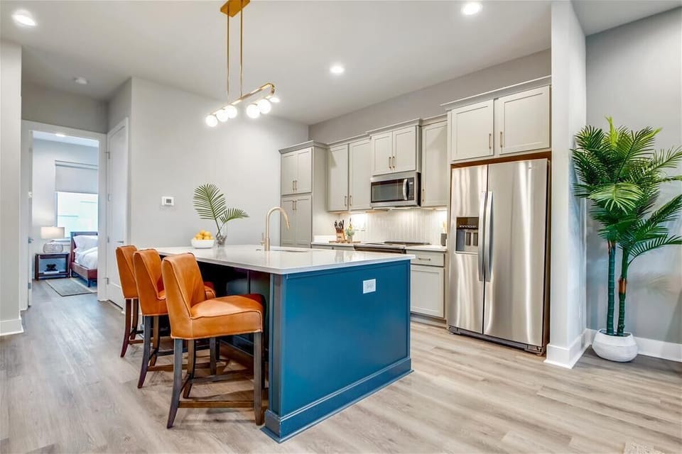 Open Concept Chef's Kitchen | Island Seating | Stainless Appliances | Second Floor
