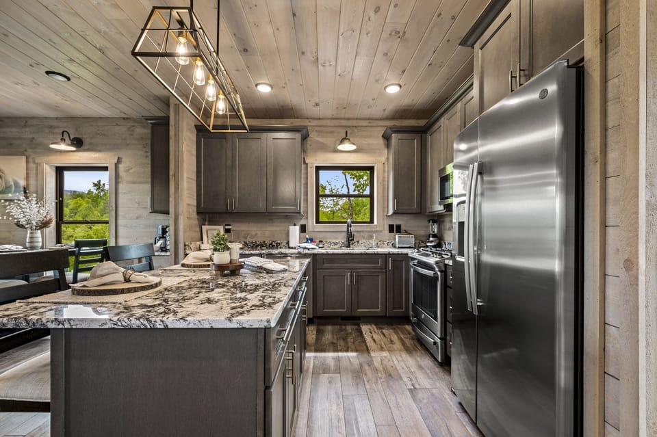 Fully Stocked Kitchen with Stainless Steel Appliances