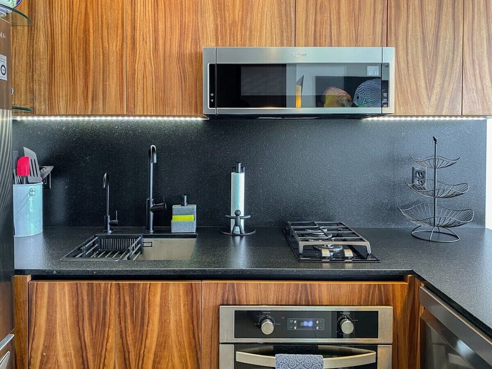 The kitchen amenities include a microwave and coffee maker