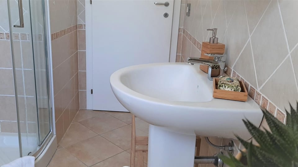Welcomely - La Terrazza sul Faro Apartment in Sardinia
