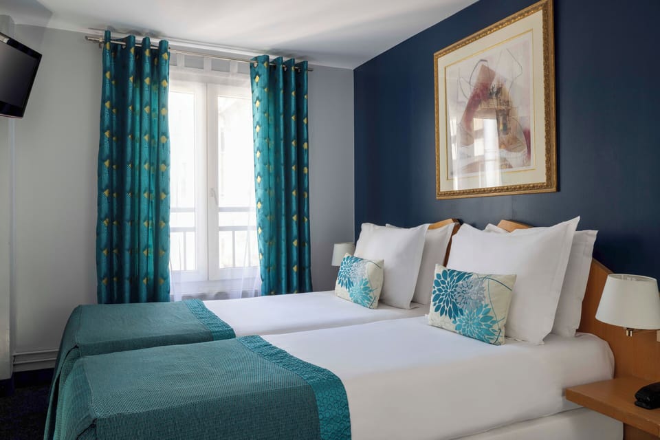 Economy Room, 2 Twin Beds | In-room safe, desk, iron/ironing board, free WiFi