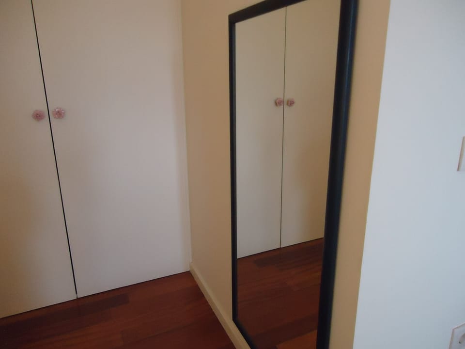 Hall dos quartos com roupeiros