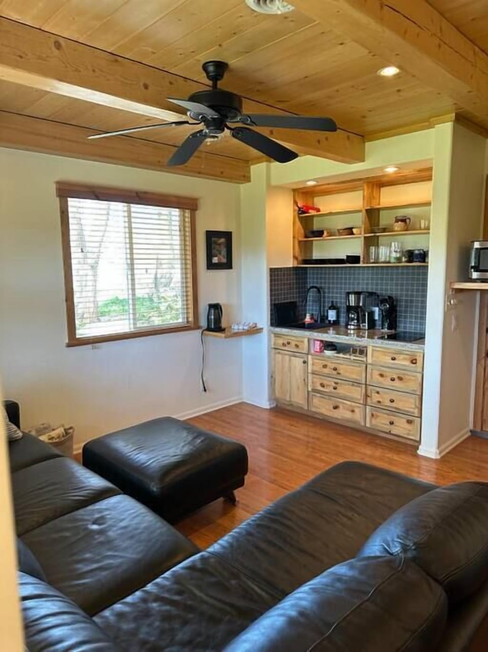 Kitchenette. Sink, stove, coffee maker