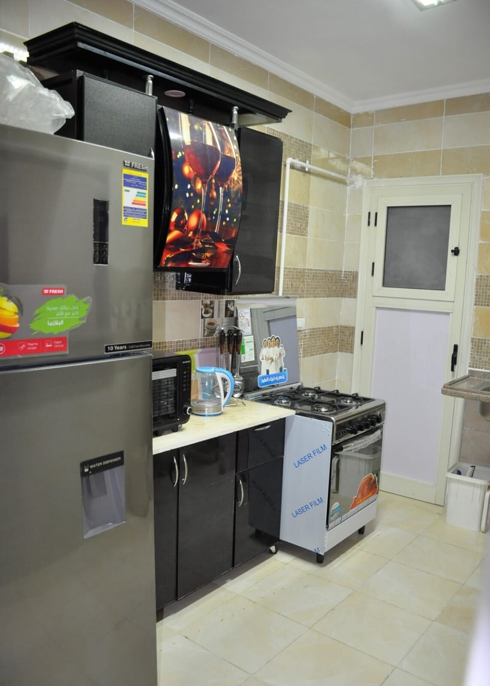 Comfort Apartment, 3 Bedrooms, Garden View | Private kitchen | Fridge, microwave, oven, stovetop