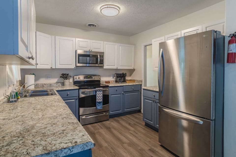 Modern kitchen w/ clean lines and functional layout for everyday cooking.