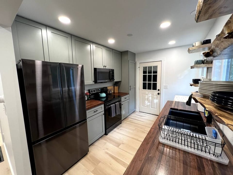 Brand new appliances include a full size fridge, oven, and dishwasher if you want to prepare your own meals. There are also a lot of great options for eating out in town too though!