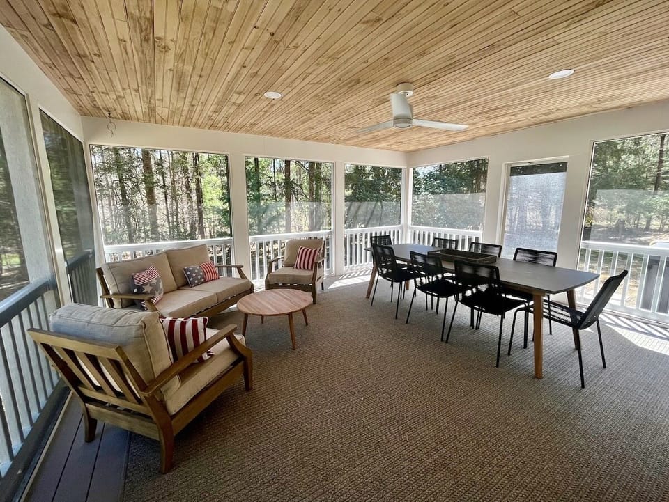 Screened porch for dining, games, and TV