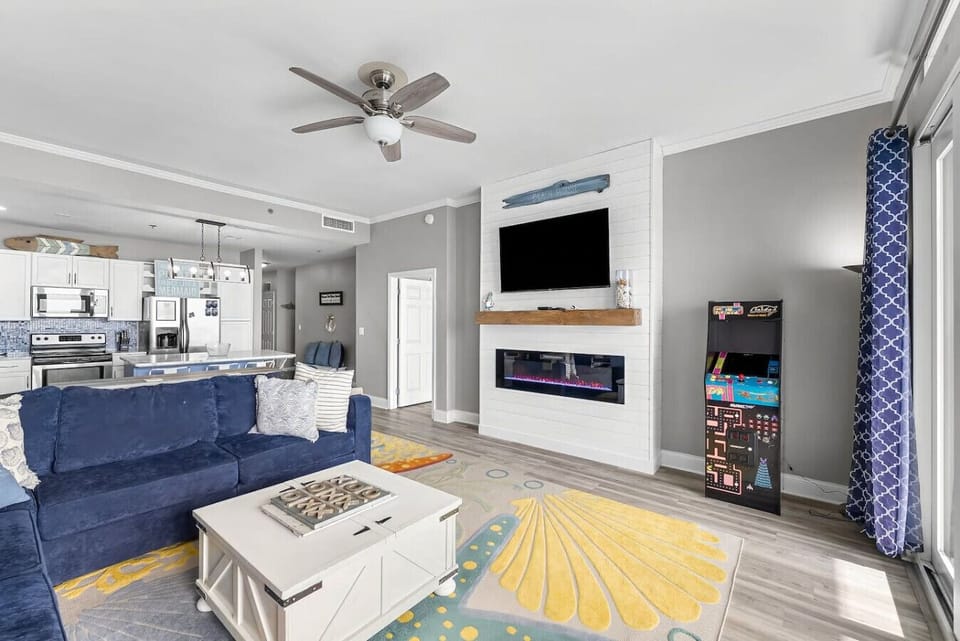 Living room with flat screen TV, arcade game and beautiful view