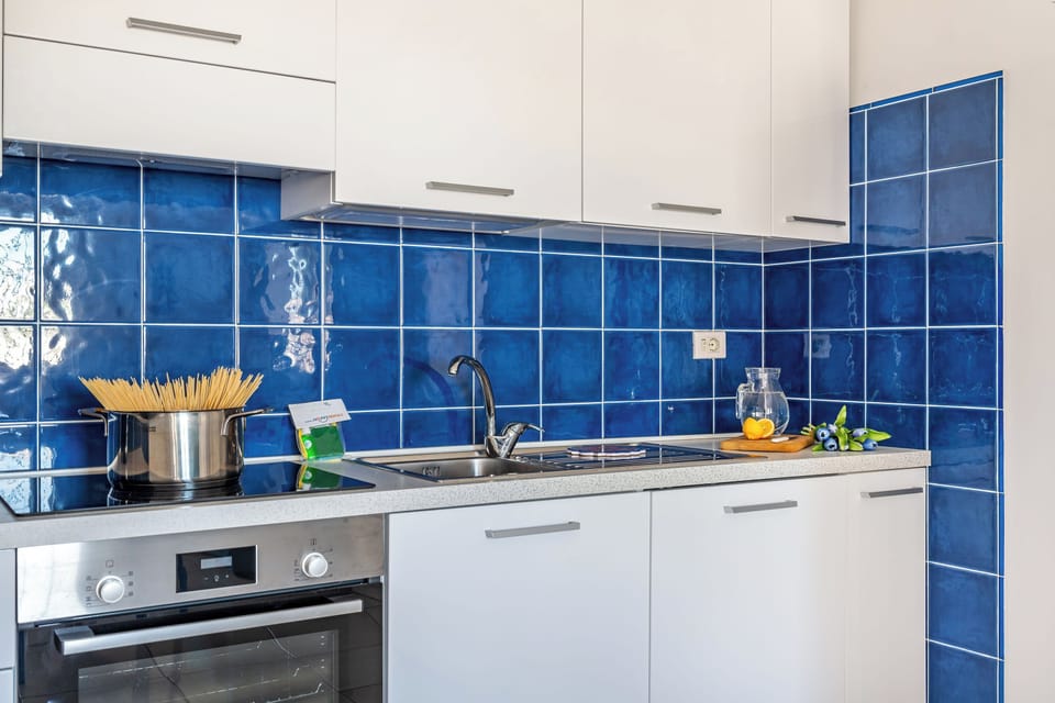 Family House, Multiple Bedrooms, 2 Bathrooms (Casa Celeste 100m From Beach) | Private kitchen | Fridge, oven, stovetop, dishwasher