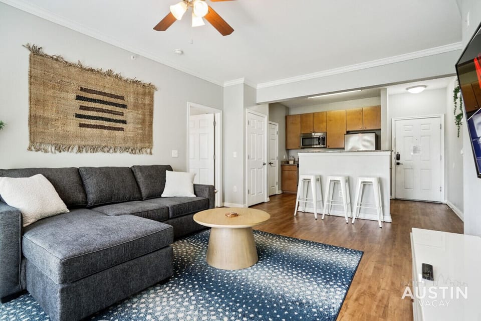 Open living room with sleeper sofa and smart tv